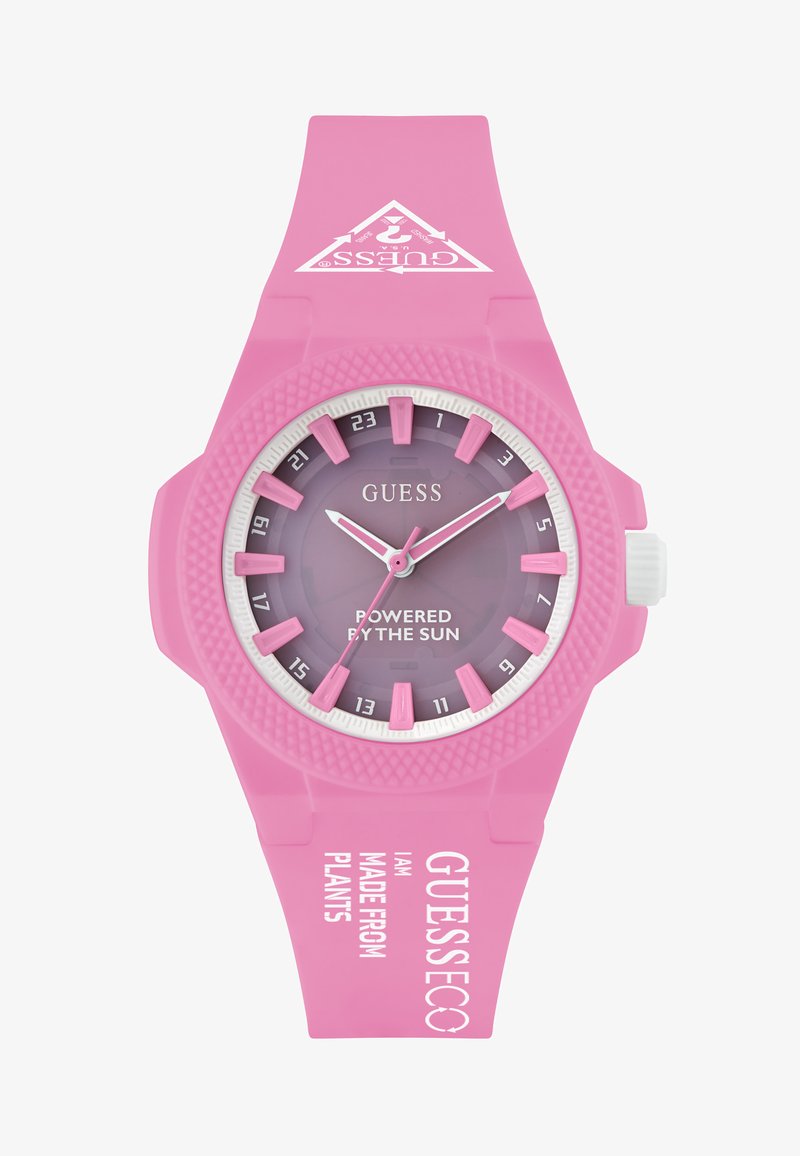 Różowy zegarek solarny z teksturowanym silikonowym paskiem. Posiada gradientową purpurową tarczę, białe oznaczenia i wyraziste akcenty.