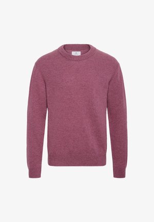 Pulóver s okrúhlym výstrihom v jednofarebnej farbe mahagónovej fialovej, vyrobený z mäkkej pleteniny. Má dlhé rukávy a rebrované manžety a lem.