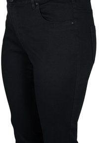 Black denim jeans featuring a slim fit, classic five-pocket design, and smooth texture with minimal stitching details.