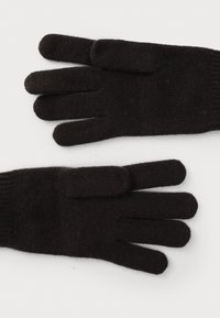 Svarta stickade handskar, sömlös design, standardform med fyra fingrar, ribbade manschetter, mjuk textur med minimal noppor synliga.