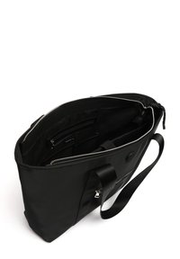 Black tote bag made of nylon with a zip closure. Features an interior pocket and adjustable webbing straps. Smooth texture, simple design.