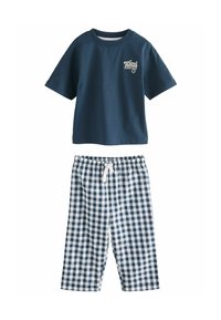 T-shirt en coton bleu marine à manches courtes avec un logo ; pantalon de pyjama à carreaux blancs et bleus marine avec une taille élastique et un cordon de serrage.