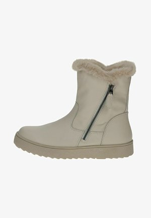 Beige ankelstøvle lavet af læder med faux fur kant, sidelukning med lynlås og tekstureret gummisål. Glat overflade med minimale syningsdetaljer.