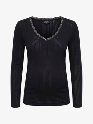Sort langærmet top med V-hals, med blonderkant og lodret ribstrikket tekstur, designet til en tætsiddende silhuet.