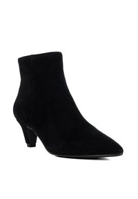 Black suede ankle boot with pointed toe and short kitten heel shown against a white background.