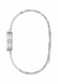 Montre en métal argenté avec un boîtier arrondi, bracelet ajustable comportant des maillons et de petites accents circulaires. Fini lisse et poli sur l'ensemble.