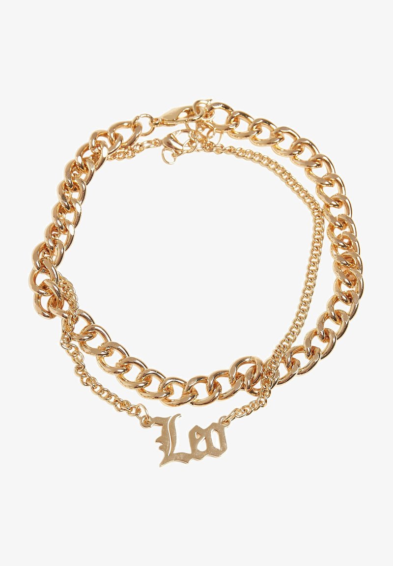 Zlatě tónovaný vrstvený náhrdelník s masivními řetězovými články, tenkým řetízkem a dekorativním přívěskem "Loo" v písmu ve stylu kurzívy. Hladký povrch.