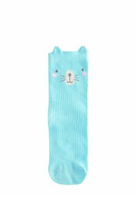 Light blue ribbed socks featuring a cartoon cat face with whiskers and pink cheeks, topped with cat ears. Soft fabric with stretch.