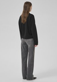 My Essential Wardrobe HELLE - Polo shirt - black