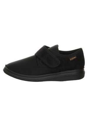 Schwarze Slipper mit einem Klettverschluss, aus einem glatten Stoff gefertigt, mit einer Gummisohle und einem kleinen Logo-Detail.