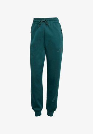 Teal jogger pants made of soft fabric; features an elastic waistband with drawstring, side pockets, and subtle branding on the leg.