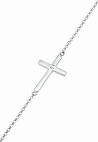 Collar de cruz de plata esterlina con un diseño plano, que presenta un acabado pulido y una cadena unida. Sellado con "925" para autenticidad.
