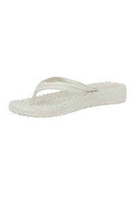 Infradito bianche con suola a trama intrecciata, dotate di sottili cinturini metallici progettati per un comfort ottimale e uno stile minimalista.