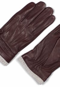 Brune skinnhansker med en ribbet beiget mansjett. Har sømdetaljer og en tett passform. Myk tekstur med en førsteklasses finish.