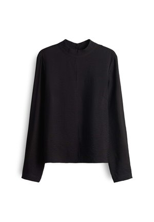 Blusa nera a maniche lunghe con colletto alto, cucitura verticale sottile sul davanti e un tessuto leggermente testurizzato.