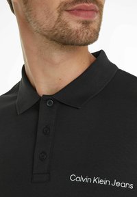 Calvin Klein Jeans INSTITUTIONAL - Polo - schwarz