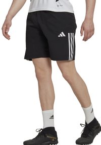 Pantaloni sportivi neri realizzati in tessuto leggero, con strisce bianche Adidas sui lati e un piccolo logo sul davanti.