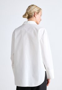 Bianco Blouson 16115