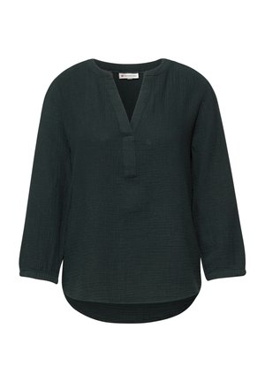 Blouse à manches longues vert foncé avec fente en V au col, tissu texturé et ourlet arrondi, avec poignets élastiqués.