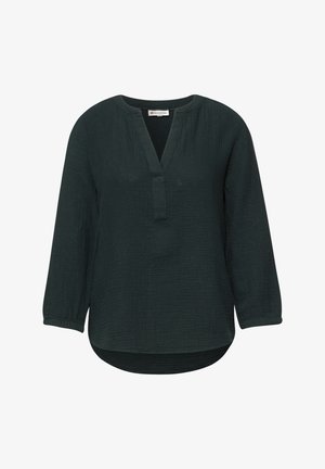 Blouse à manches longues vert foncé avec fente en V au col, tissu texturé et ourlet arrondi, avec poignets élastiqués.