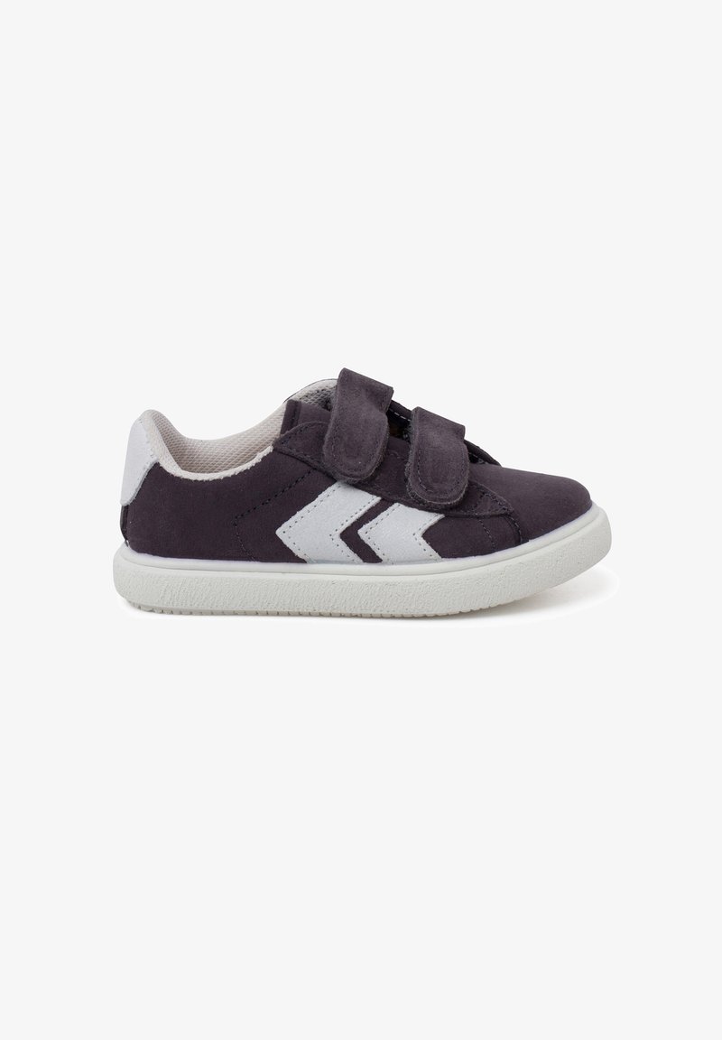 Purple suede shoe with two Velcro straps, white accents, and a textured rubber sole. Features chevron design on the side.