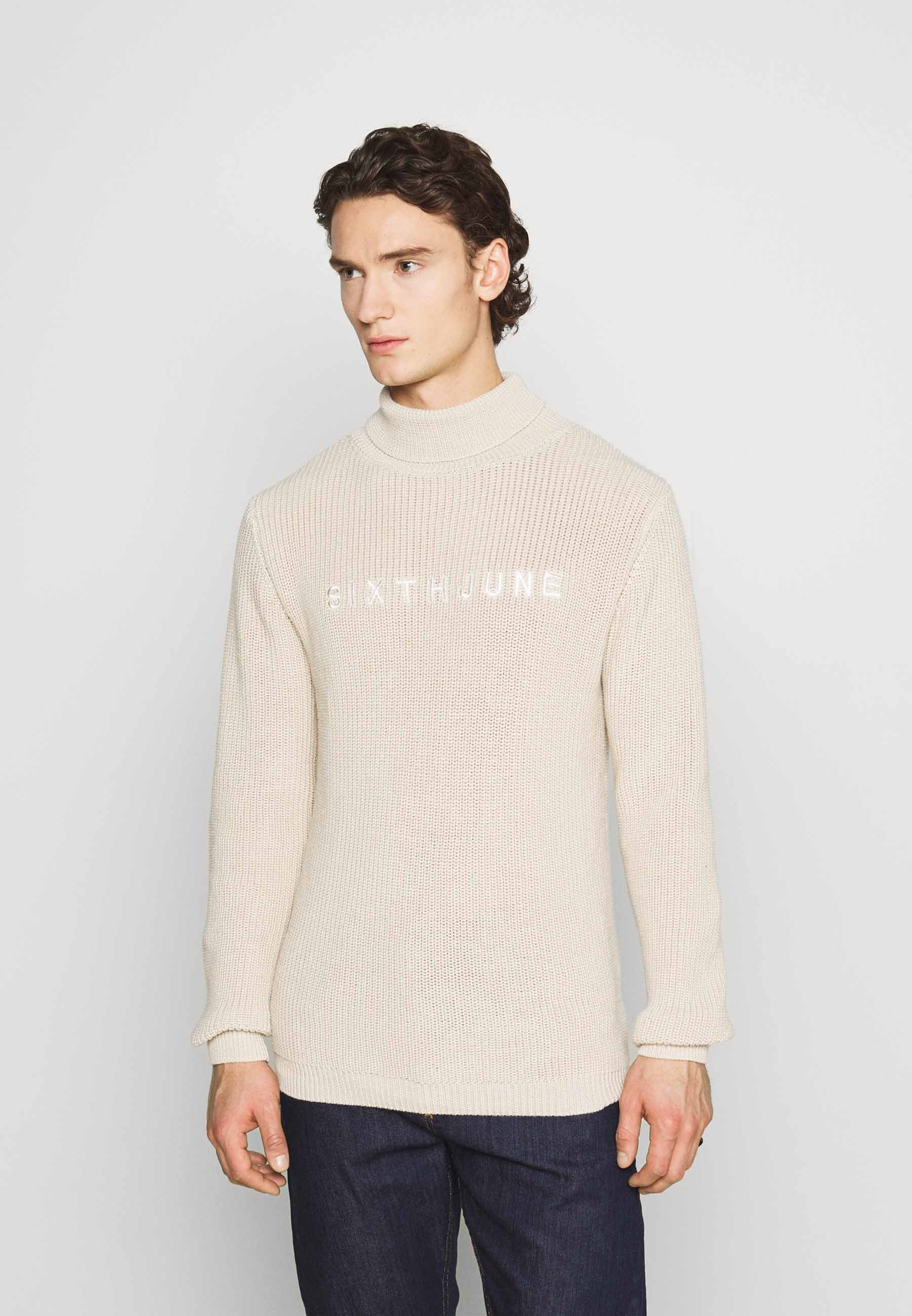 high neck beige jumper
