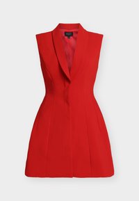 Red sleeveless dress with a notched collar, structured design, tailored fit, and accentuated waist. Made from smooth fabric with side seams.