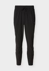 WARM UP - Pantalon de survêtement - black