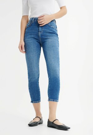 - Jeansy Skinny Fit