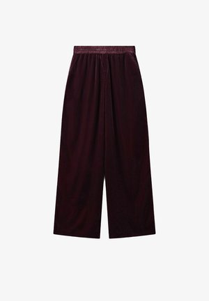 Bordeauxrode wijde broek met elastische tailleband, gemaakt van zachte stof, met een gladde textuur en een losse pasvorm.