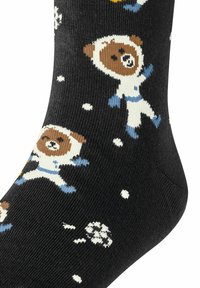 Schwarze Socken mit Bären in Raumanzügen, illustriert in Braun, Weiß und Blau, mit verstreuten weißen schneeflockenähnlichen Punkten. Material aus Baumwollmischung.