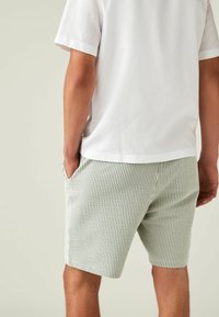 Next SEERSUCKER STRIPED  - REGULAR FIT - Tepláky - sage green