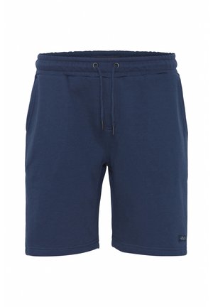 Marinblå bomullsshorts med elastisk midja, dragsko och fickor på sidan. Slät textur med sydda fållar. Liten logotags längst ner.