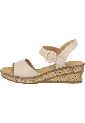 Beige wedge sandals with a soft leather upper, an adjustable ankle strap featuring a circular accent, and a textured cork-like sole.