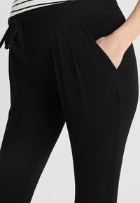 Envie de Fraise OSCAR - Calças de fato de treino - black