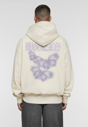 Creme hoodie med et stort, lilla sommerfuglegrafik på ryggen, der har en afslappet pasform og rummelig hætte. Fremstillet af blødt stof.