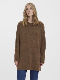Brown knitted sweater with long sleeves, loose fit, round neckline, and a soft texture. Paired with blue denim jeans.
