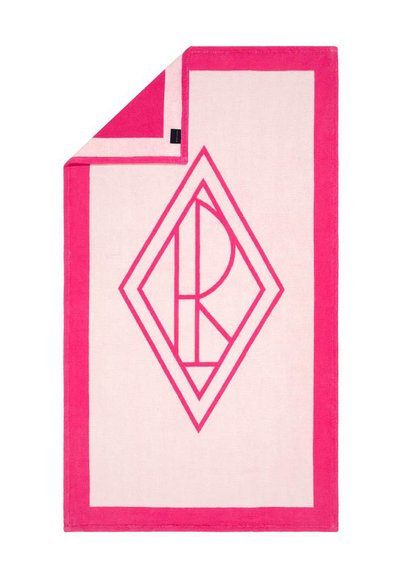 Ρόζ και κρεμ ορθογώνια πετσέτα με διαμαντένιο μοτίβο και λογότυπο στο κέντρο, περιτριγυρισμένη από έντονο ροζ περίγραμμα. Μαλακή υφή.