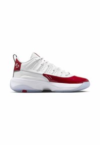 Sneaker bianco a taglio basso con dettagli in pelle verniciata rossa sulla punta e sul tallone, lacci bianchi e suola traslucida.