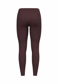 Bruine leggings van een gladde, rekbare stof, met een hoge tailleband en geen zichtbare naden, ontworpen voor comfort en bewegingsvrijheid.