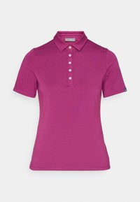 Fuchsia Poloshirt mit kurzen Ärmeln aus weichem Stoff. Verfügt über einen klassischen Kragen, eine Knopfleiste mit fünf Knöpfen und ein Etikett am linken Ärmel.