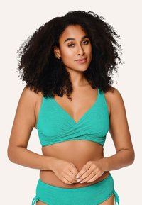 Teal textuur bikini-top met een wikkelontwerp en brede schouderbanden. Bevat een bijpassende onderkant met verstelbare stropen aan de zijkanten.
