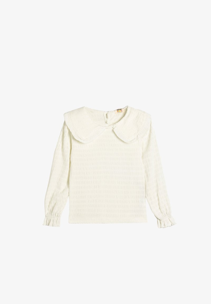 Weiße Bluse mit langen Ärmeln aus strukturiertem Stoff, mit großem, runden Kragen und gerafften Manschetten an den Ärmeln. Knopfverschluss auf der Rückseite.