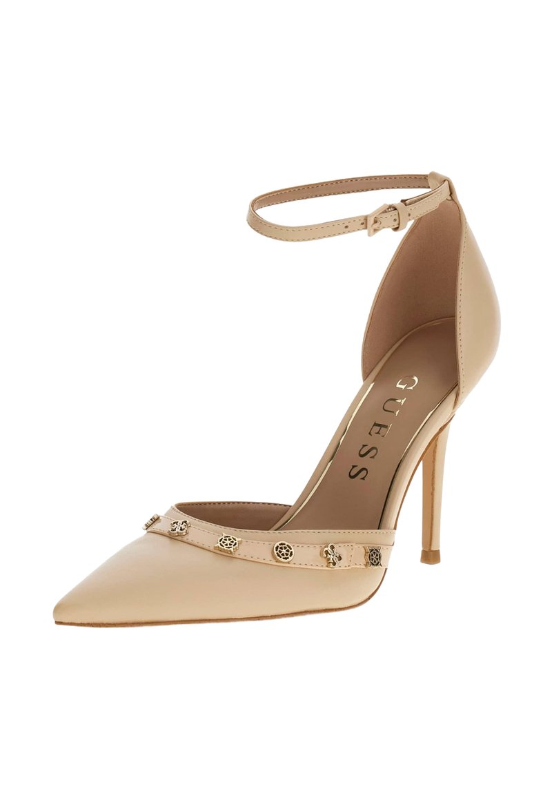 Beżowe szpilki z zakrzywionym noskiem i paskiem wokół kostki. Z przodu ozdobione złotymi detalami. Gładka faktura skóry.