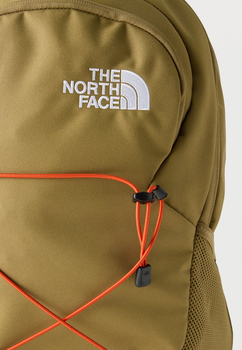 he north face jester backpack burnt olive green red orange The The innovative front bungee system offers additional storage options The North Face - Brandclub