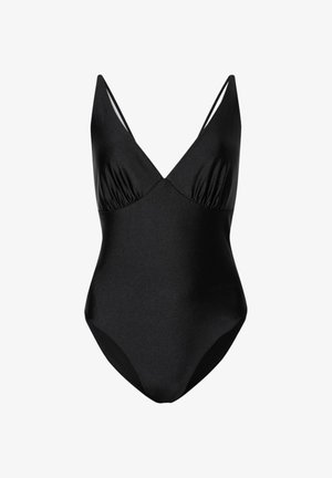 Maillot de bain une pièce noir avec un décolleté en V profond et de fines bretelles, présentant un léger froncé sous la poitrine.