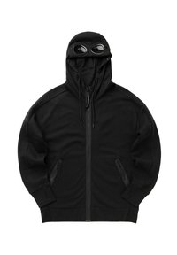 Felpa nera con cappuccio, apertura con zip, due tasche laterali inclinate e occhiali rimovibili. Tessuto morbido, design oversize e lacci regolabili.