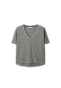 T-shirt à rayures noir et blanc avec un col en V, des manches courtes, une coupe décontractée et un ourlet arrondi. Fabriqué en tissu doux et extensible.