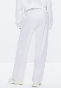 Miss Sixty DONNA - Pantalones deportivos - white