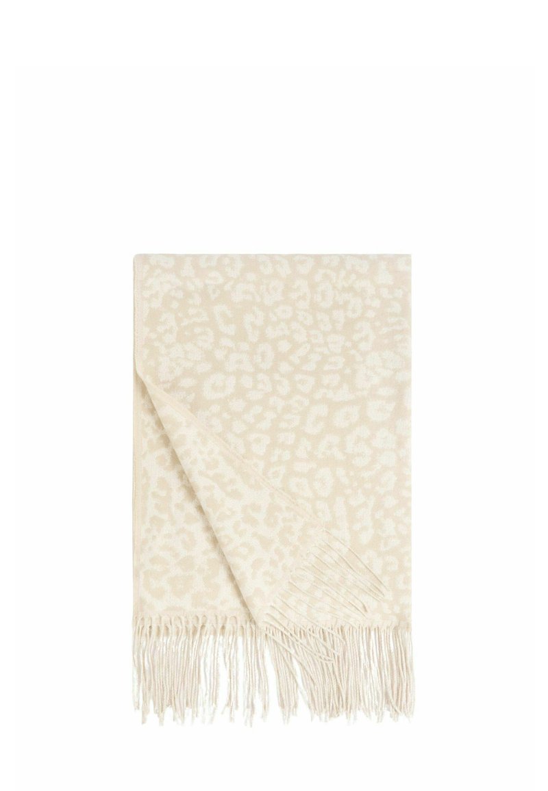 Coperta color crema con un sottile motivo leopardato, bordi frangiati, texture morbida e forma rettangolare. Dettagli sul materiale non specificati.